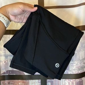Lululemon Black Leggings with Sheer Mesh Panels Size 4 Excellent Condition